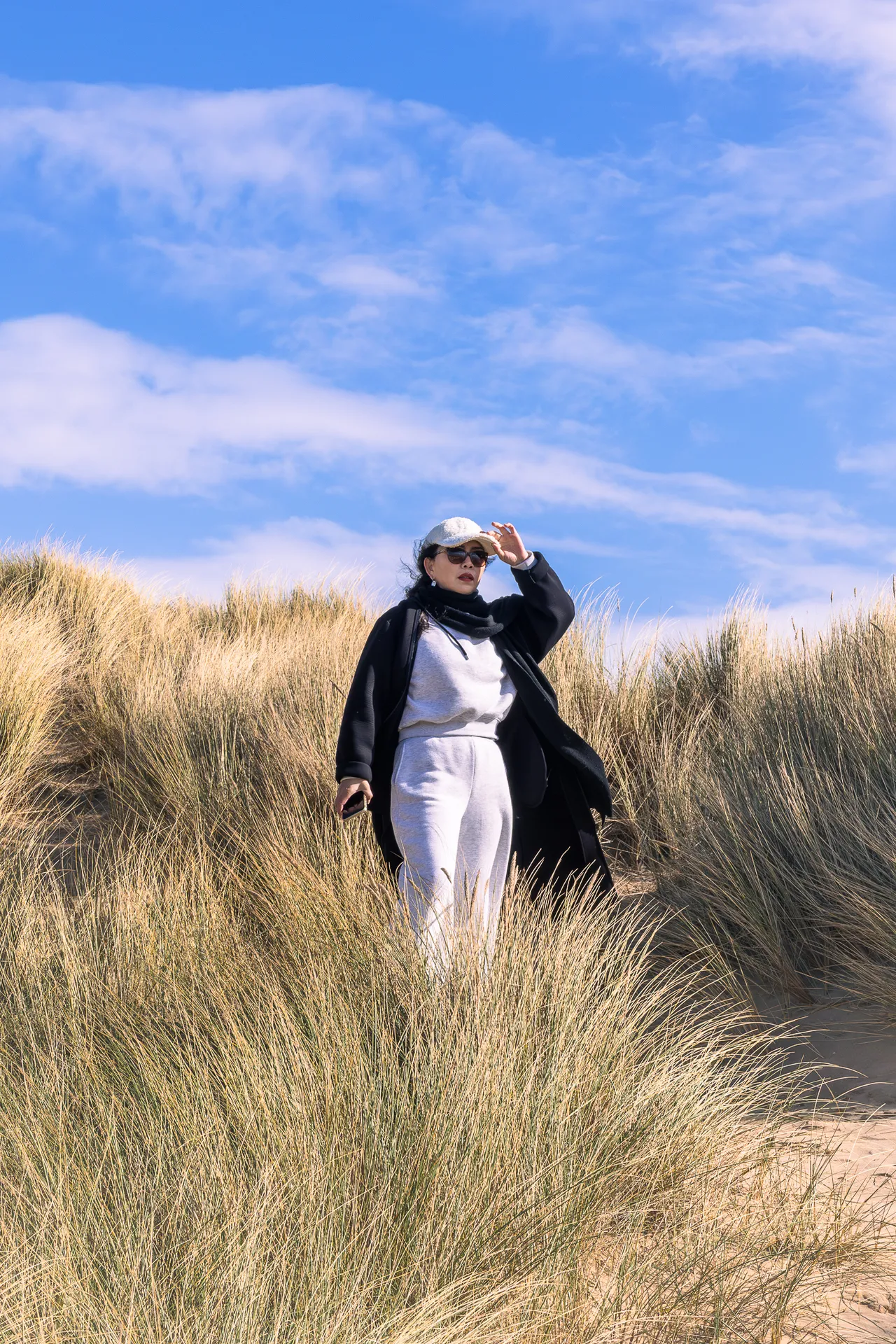 A woman standing in the desert